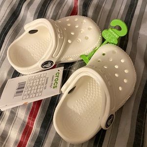 Brand new white baby crocs size 4 bought the wrong size